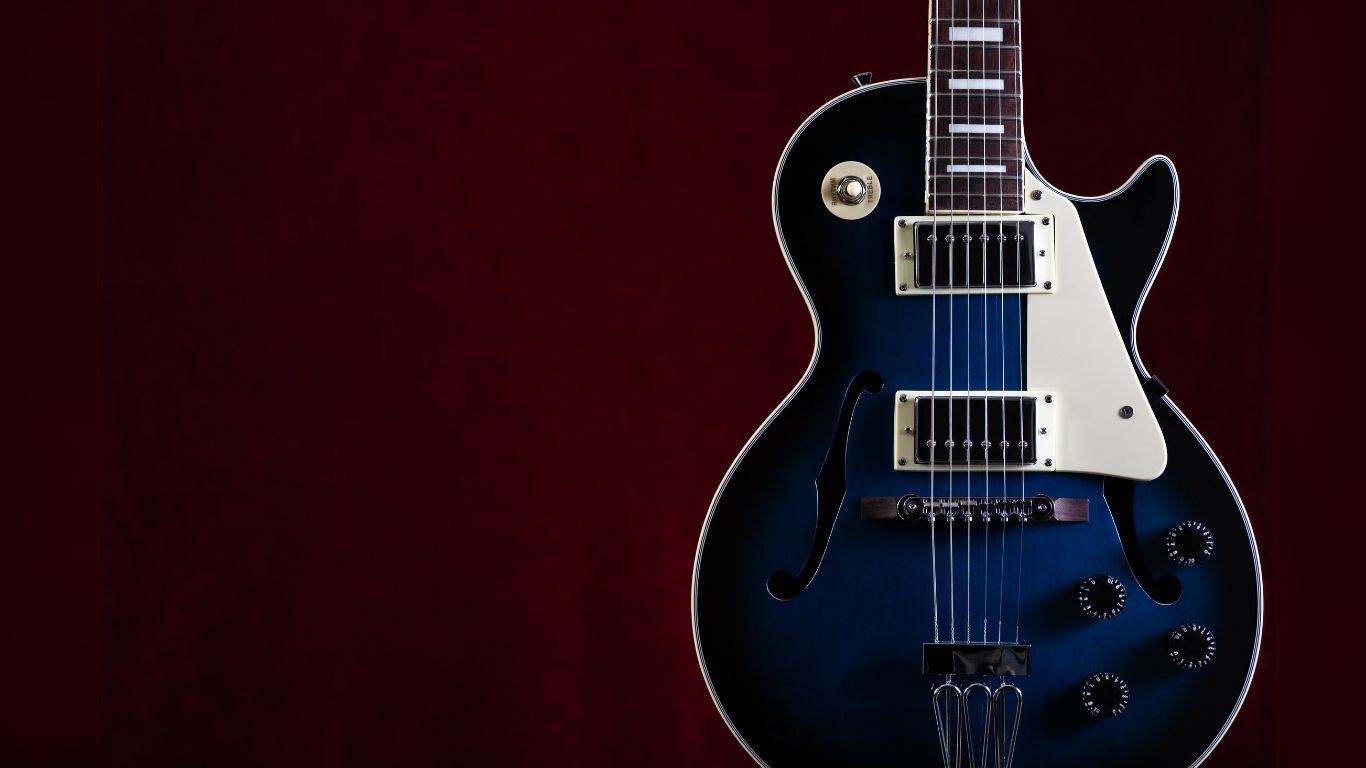 Blues Guitar blue electric guitar on a red background
